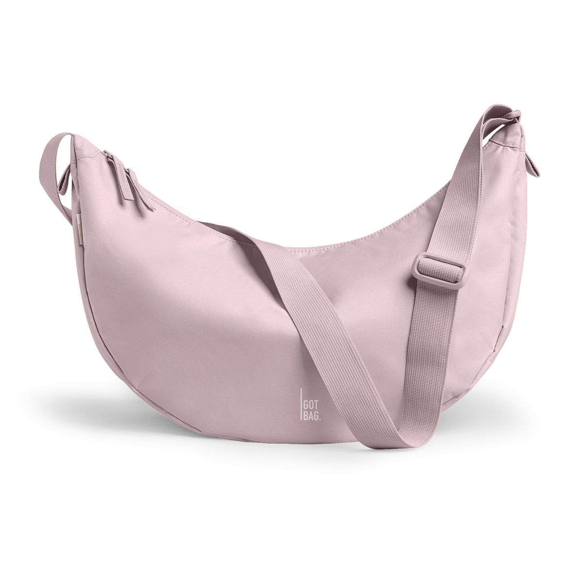 MOONBAGLARGEMONOCHROME Tasche in pinkdolphin (blasses Hellrosa) als Studioaufnahme in Frontansicht.