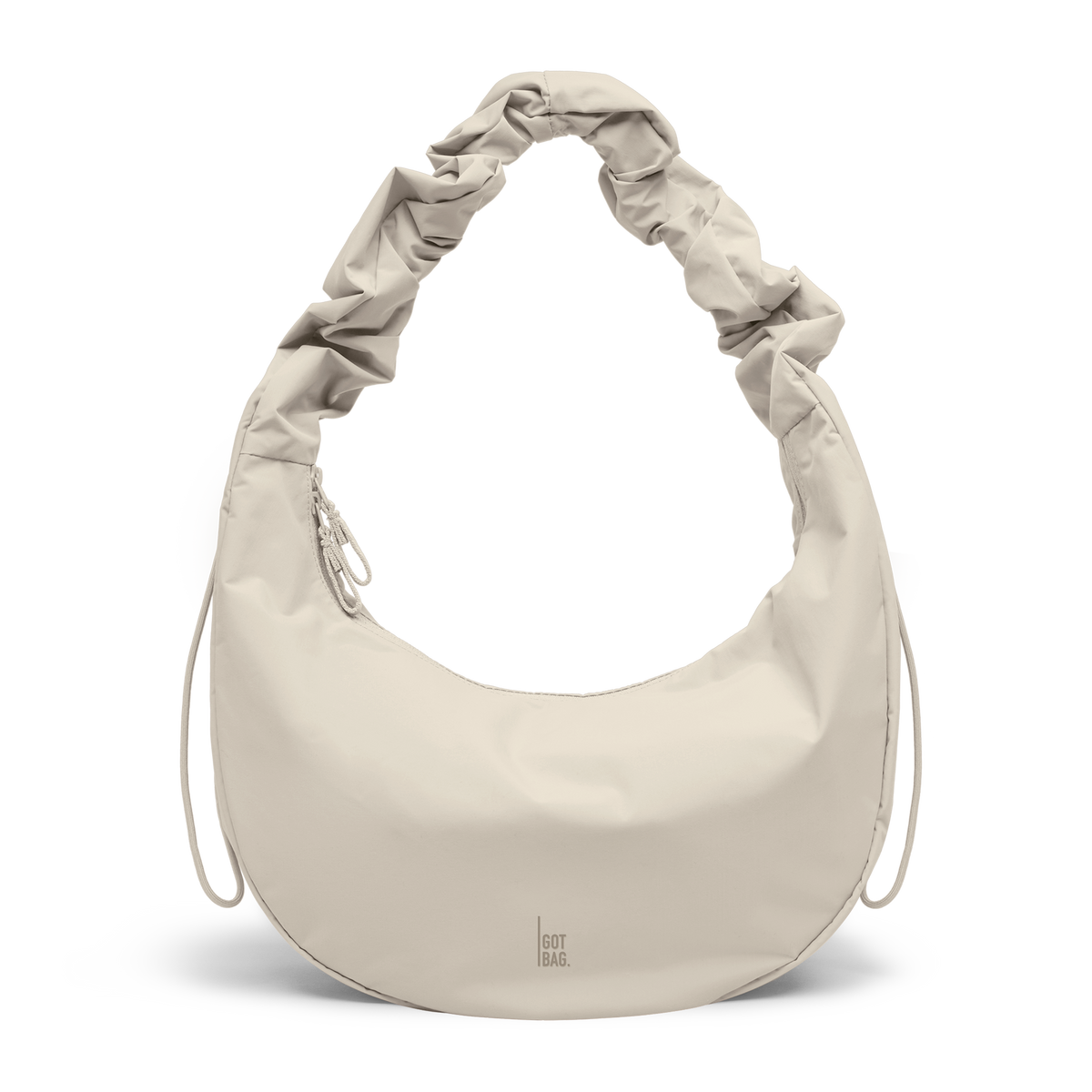 MOON BAG RUFFLE Tasche in soft shell (warmes Cremeweiß) als Studioaufnahme in Frontansicht.