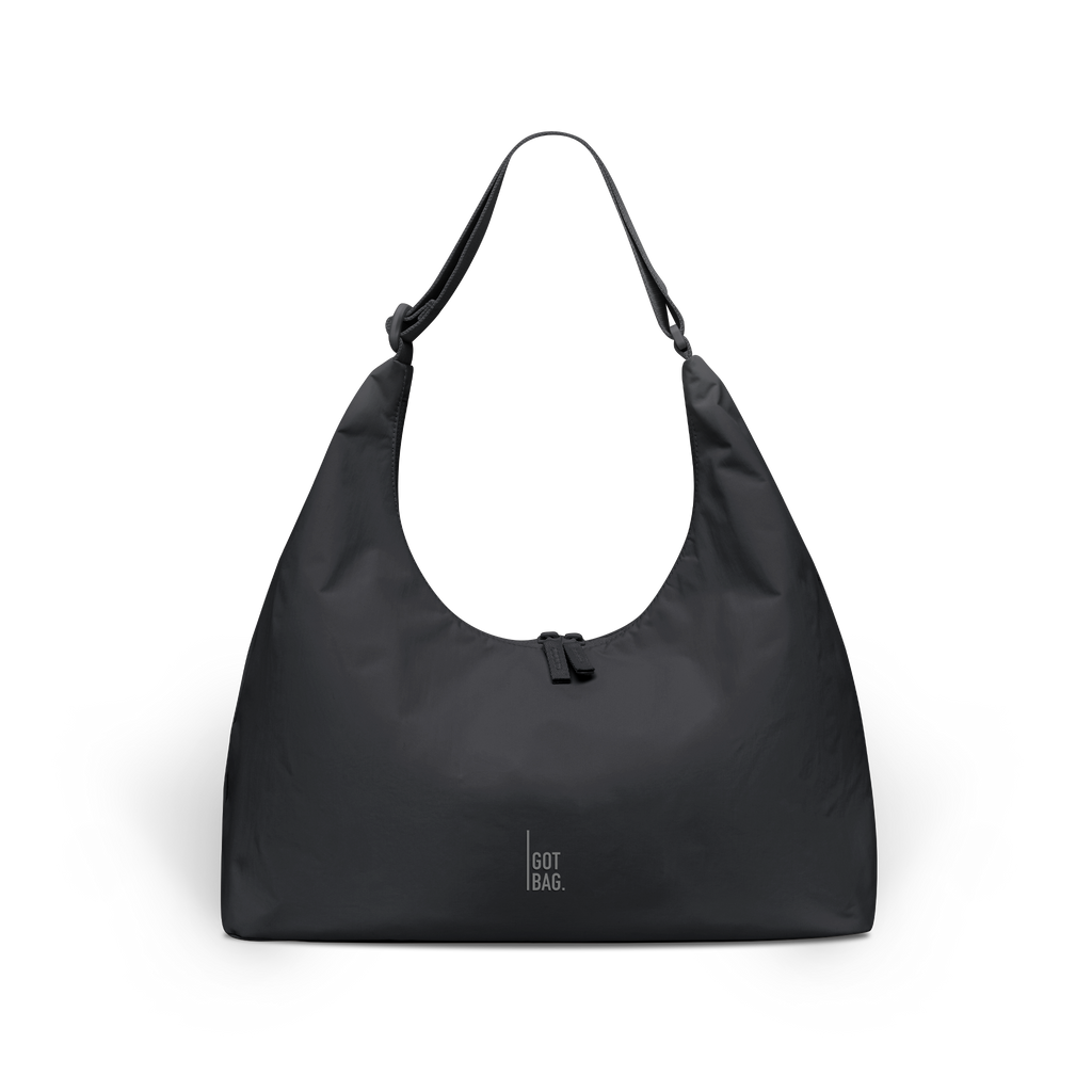 T SHAPE BAG Tasche in black (Schwarz) als Studioaufnahme in Frontansicht.
