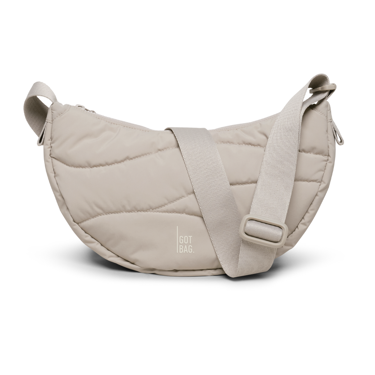 WAVY PUFFER MOON BAG Tasche in scallop (helles Beige) als Studioaufnahme in Frontansicht.